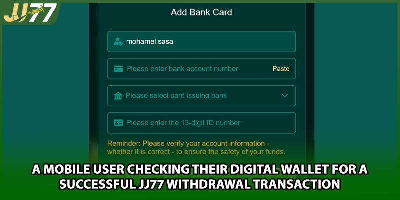 A mobile user checking their digital wallet for a successful JJ77 withdrawal transaction
